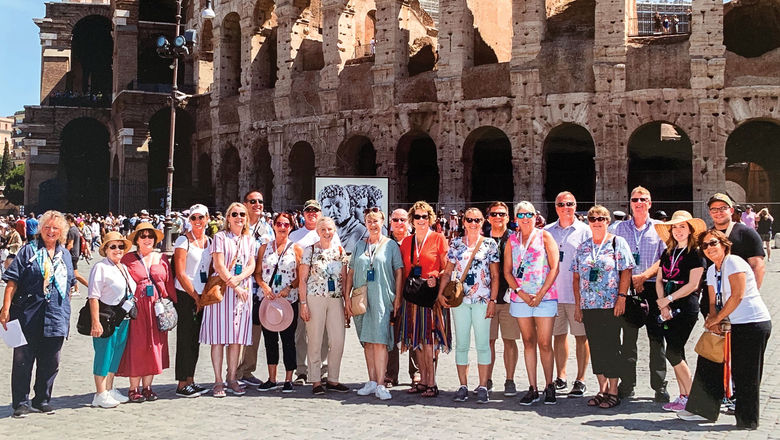 A tour group pauses for a photo in Italy last year.