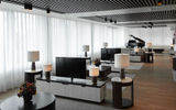 The Silver Origin's Explorer Lounge serves as its library, a room for daily lectures and briefings and, by night, a spot for cocktails and live piano performances.