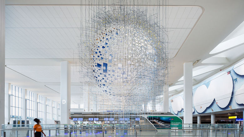 High ceilings and custom artwork punctuate the light, bright design of Terminal B's new arrivals and departures hall.