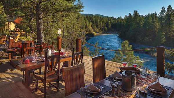 An outdoor dining pavilion at the Resort at Paws Up in Montana.