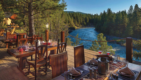 An outdoor dining pavilion at the Resort at Paws Up in Montana. An outdoor dining pavilion at the Resort at Paws Up in Montana.