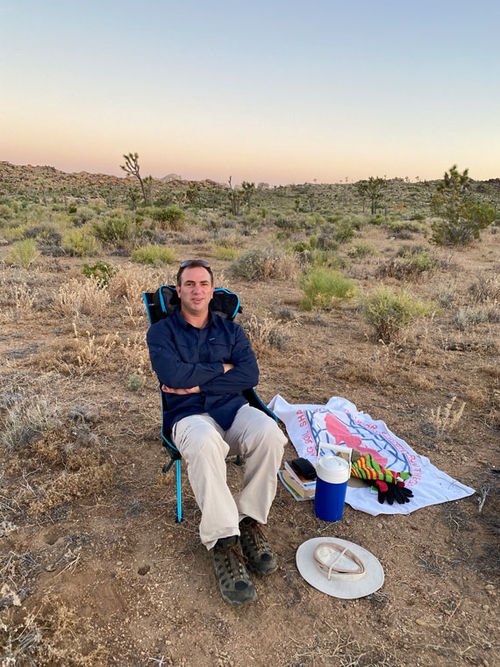 The sit that started it all: Senior editor Robert Silk sitting in the Mojave Desert at Joshua Tree National Park in June 2020.