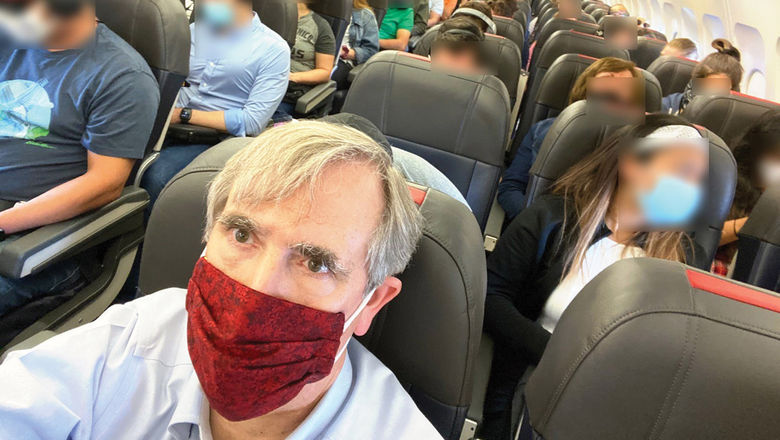 Democratic Sen. Jeff Merkley of Oregon tweeted this photo of a crowded American Airlines plane on July 2. American is among the airlines that aren't blocking seats.