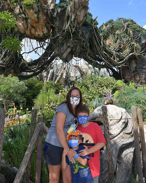 Kristen Buckshire, owner of Travel Ease in Cape Coral, Fla., with her sons Grant, 9, and Carter, 5, in Disney's Animal Kingdom on Sunday, the day after it reopened to the public. Kristen Buckshire, owner of Travel Ease in Cape Coral, Fla., with her sons Grant, 9, and Carter, 5, in Disney's Animal Kingdom on Sunday, the day after it reopened to the public.