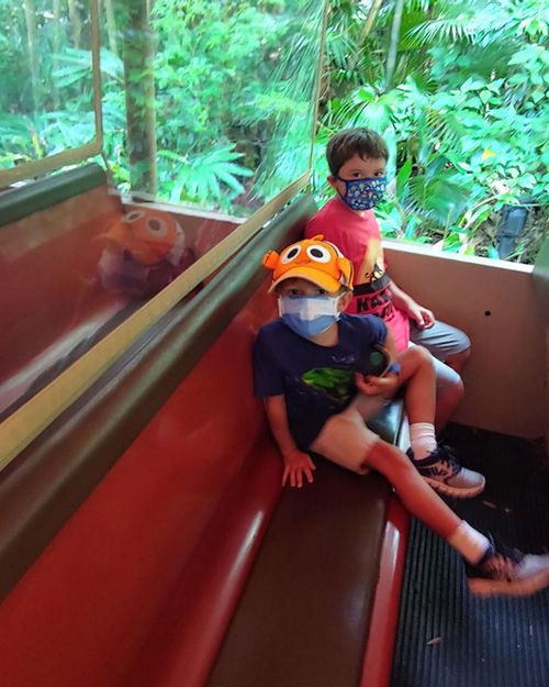 Some ride vehicles have been retrofitted with barriers to separate guests. Here, Kristen Buckshire's sons Carter and Grant are on a safari vehicles on Kilimanjaro Safaris. Some ride vehicles have been retrofitted with barriers to separate guests. Here, Kristen Buckshire's sons Carter and Grant are on a safari vehicles on Kilimanjaro Safaris.
