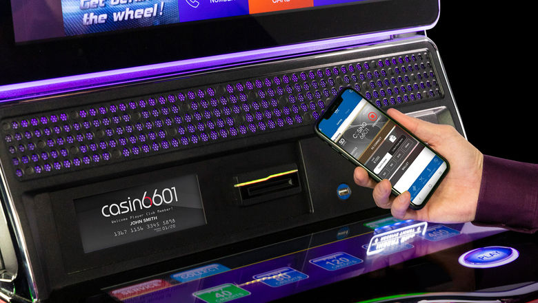 Scientific Games Corp. is introducing ways players can use their phones to interact with gaming machines in casinos.