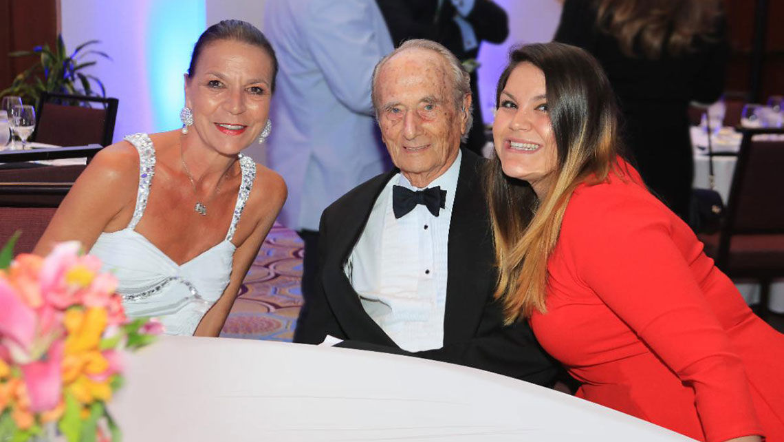 Heinz Simonitsch is pictured with his wife Elisabeth, left, and daughter Christina at the Icon of Hospitality celebration in Puerto Rico in 2018.