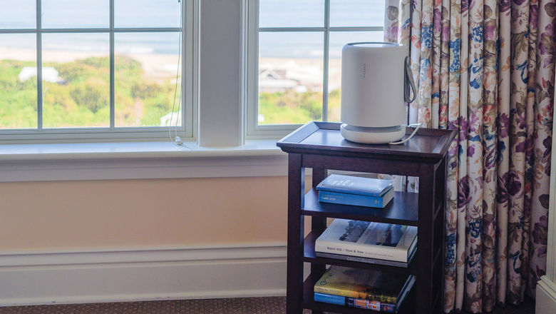 A Molekule air purifier in an Ocean House Management Collection guestroom.