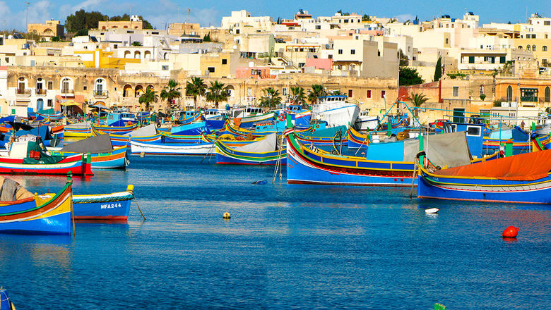 Traditional Maltese fishing boats in Marsaxlokk Harbour.