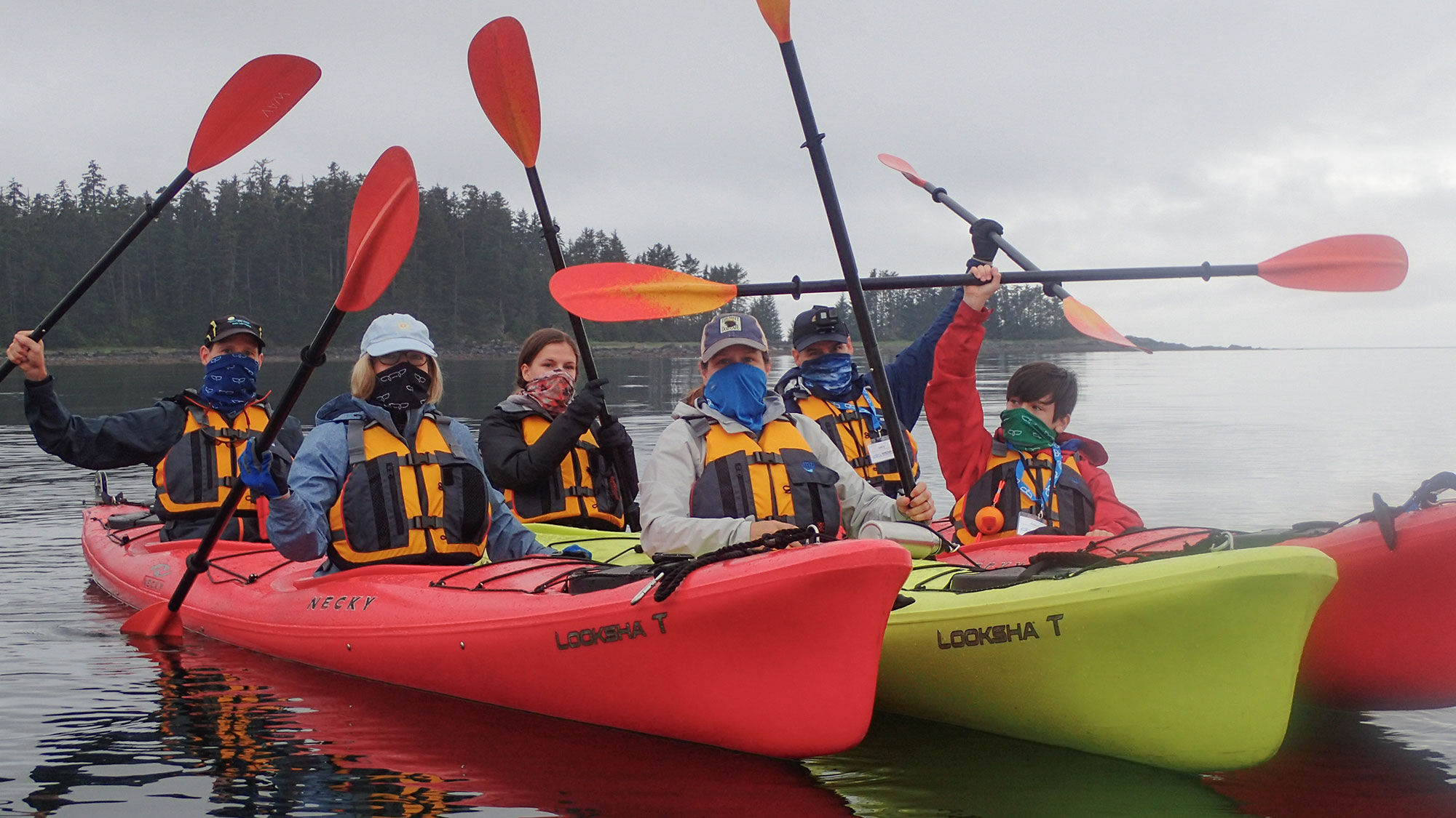 Passengers on the Wilderness Adventurer in kayaks during the line's first Alaska cruise in 2020, which was cut short after a passenger's Covid test came back positive.