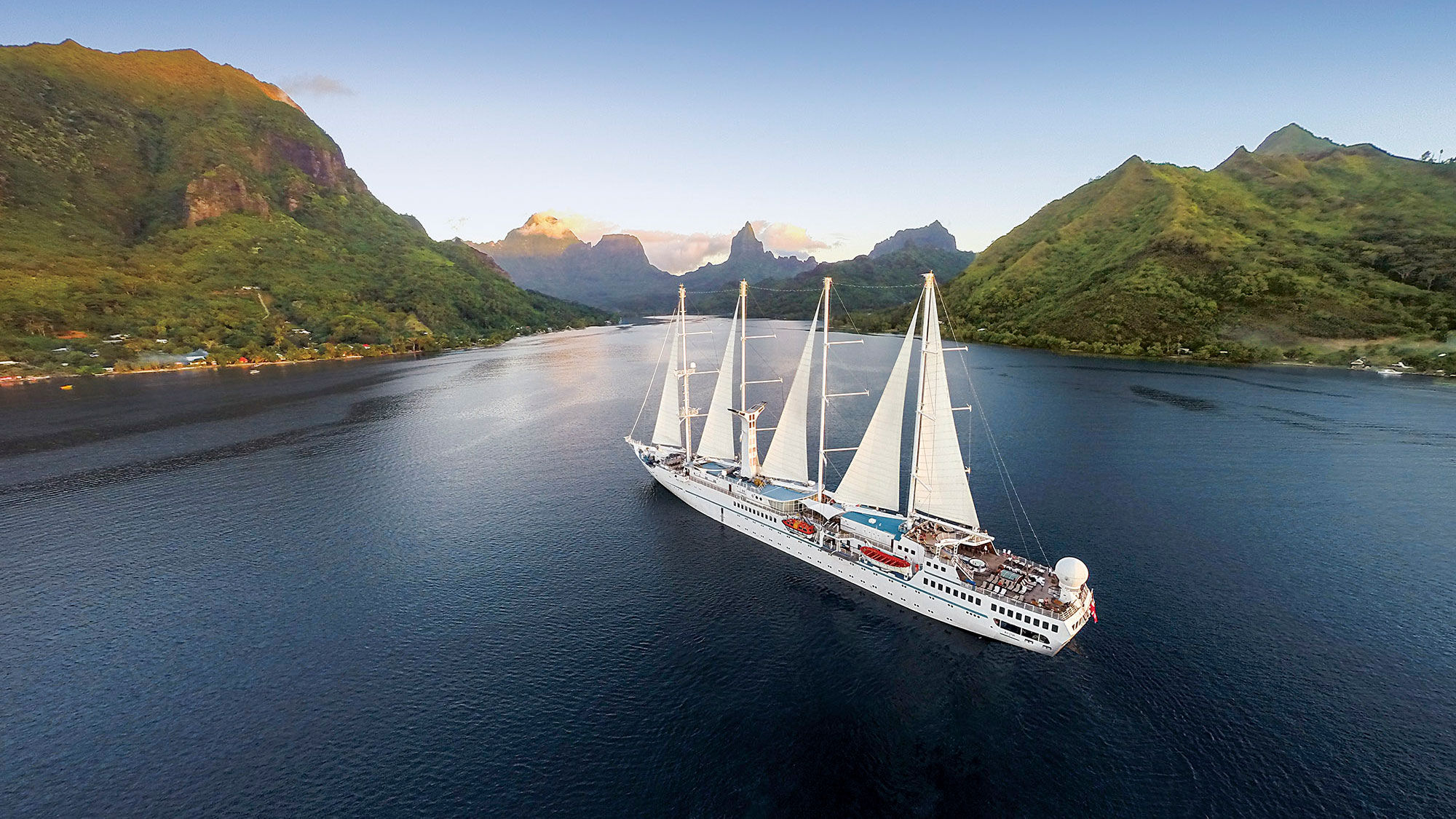 The WindSpirit sailing in Moorea. Windstar Cruises is now a member of the USTOA.