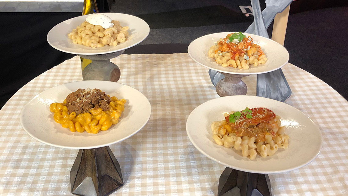 A Taste of the International Food & Wine Festival is part of the admission to Epcot until later this fall. Here, four varieties of macaroni and cheese are displayed.