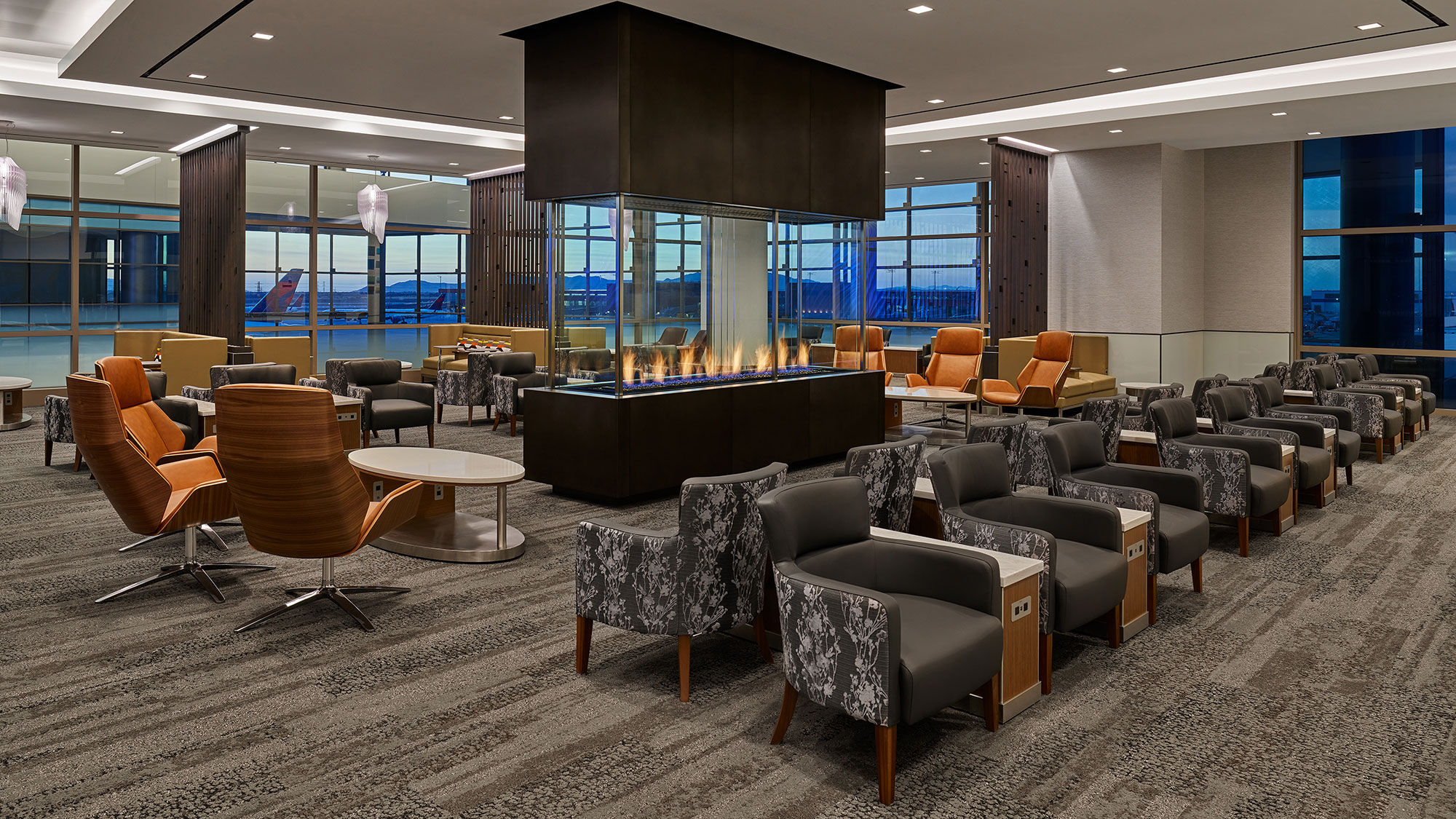 The new SkyClub at Salt Lake City Airport is Delta's largest. It features two bars, two buffets and views of the Wasatch Mountains.