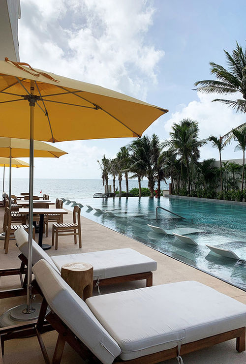 The pool at the Fives Oceanfront, which opened in July. The pool at the Fives Oceanfront, which opened in July.