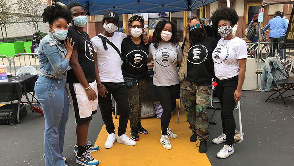 Berry, second from right, with alumni and students currently enrolled in the program. Berry, second from right, with alumni and students currently enrolled in the program.