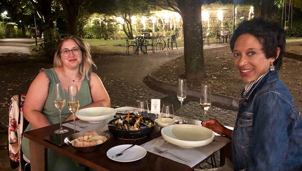 The author and a local friend, Claudia Macedo, dining outdoors at the Boeira Garden Hotel in Vila Nova de Gaia.