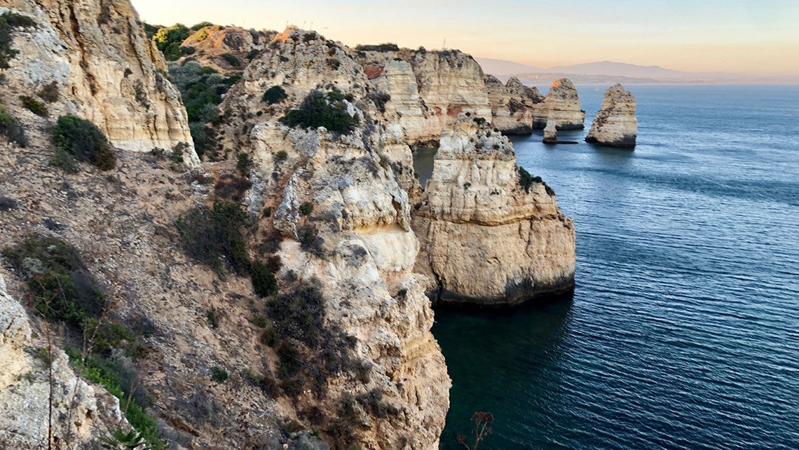 Ponta da Piedade in Lagos, Portugal. The country will see a leap in air service from the U.S in July and August following its reopening to U.S. tourists on June 15.