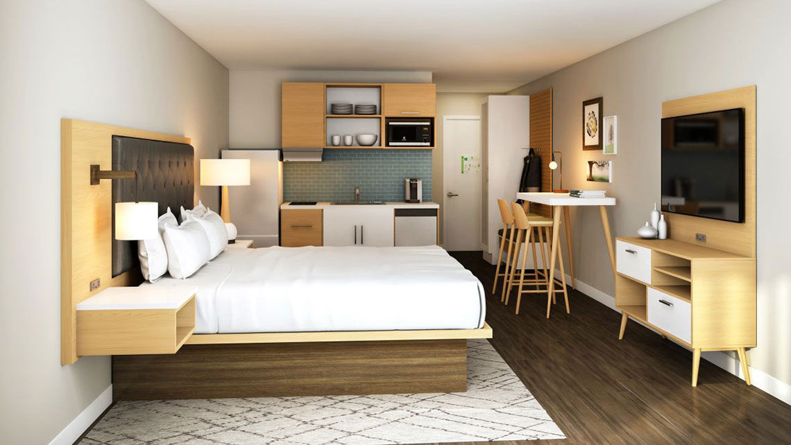 Rendering of a GuestHouse Extended Stay unit with mini-kitchenette.