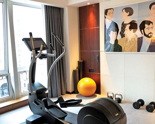 Fitness equipment in a Deluxe room at the Langham New York. Fitness equipment in a Deluxe room at the Langham New York.