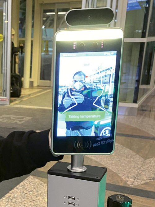 Verifly users have their temperature scanned before entering their own TSA screening lane.