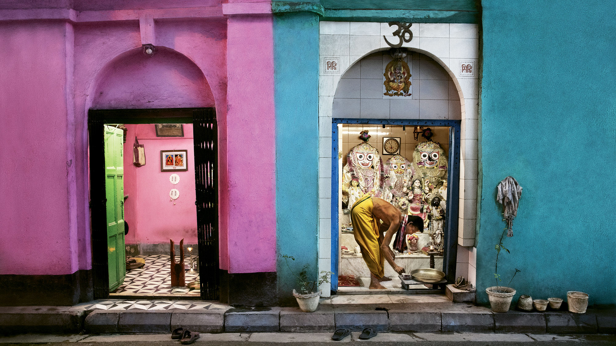 Hindu priest preparing for the evening puja (prayer), Kolkata, India, 2018.