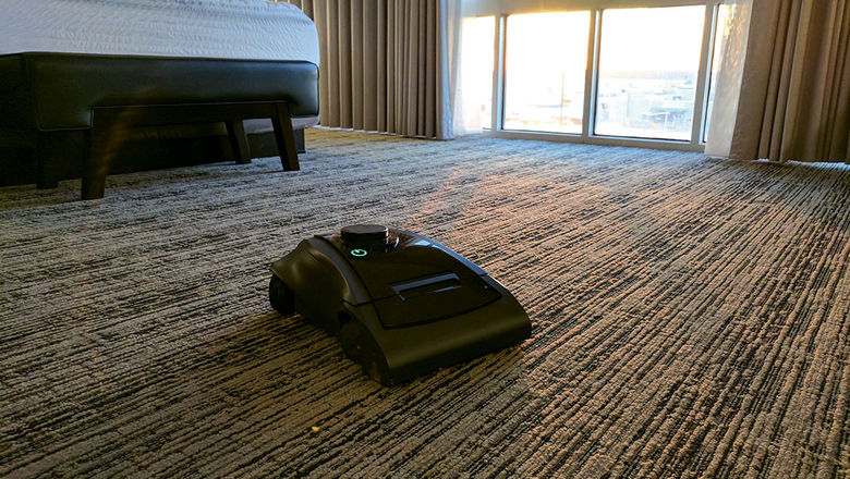 Maidbot's "Rosie" cleans a hotel room floor at the Marina Bay Sands in Singapore.