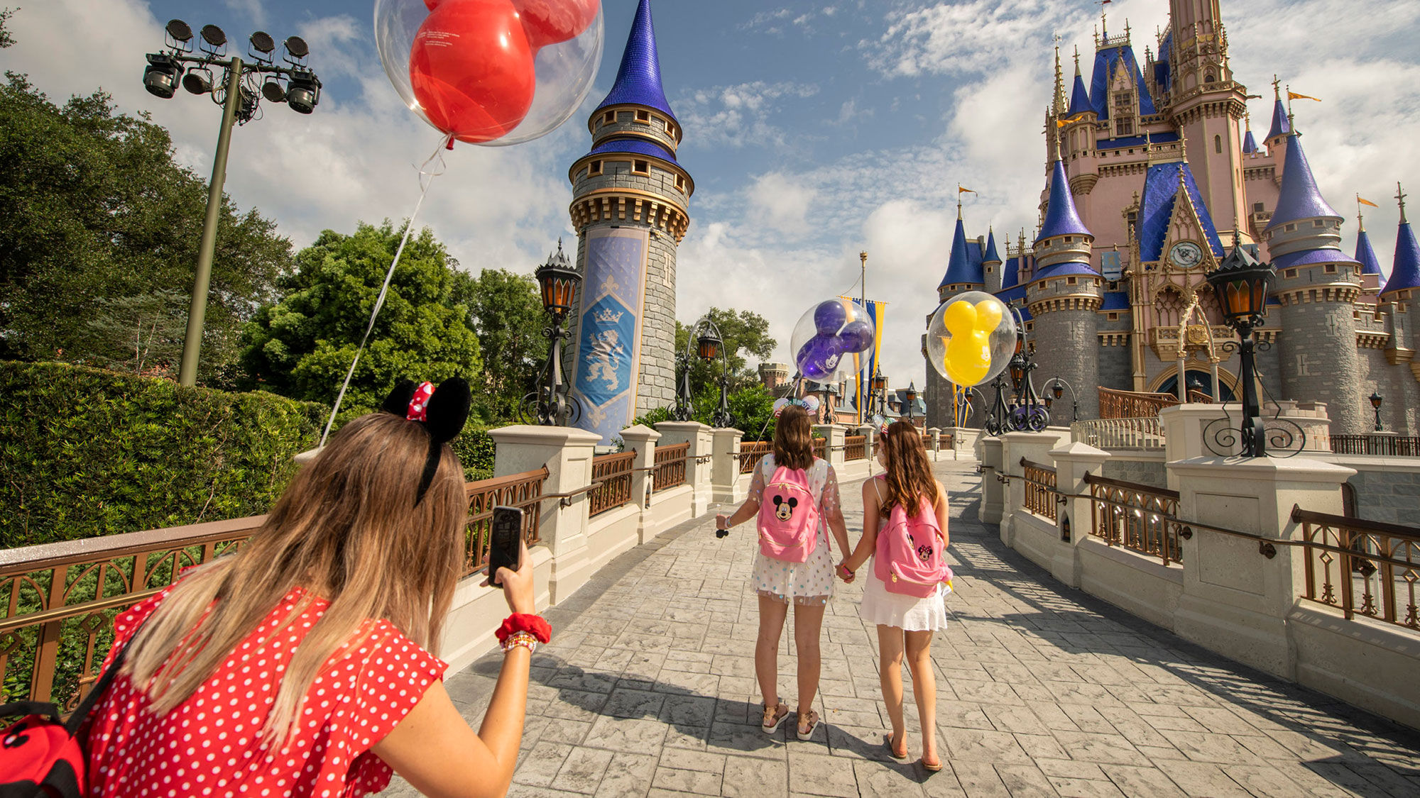 Disney is planning in January to reintroduce its Park Hopper passes, so that guests may visit more than one park in a day. Pictured, the Magic Kingdom.