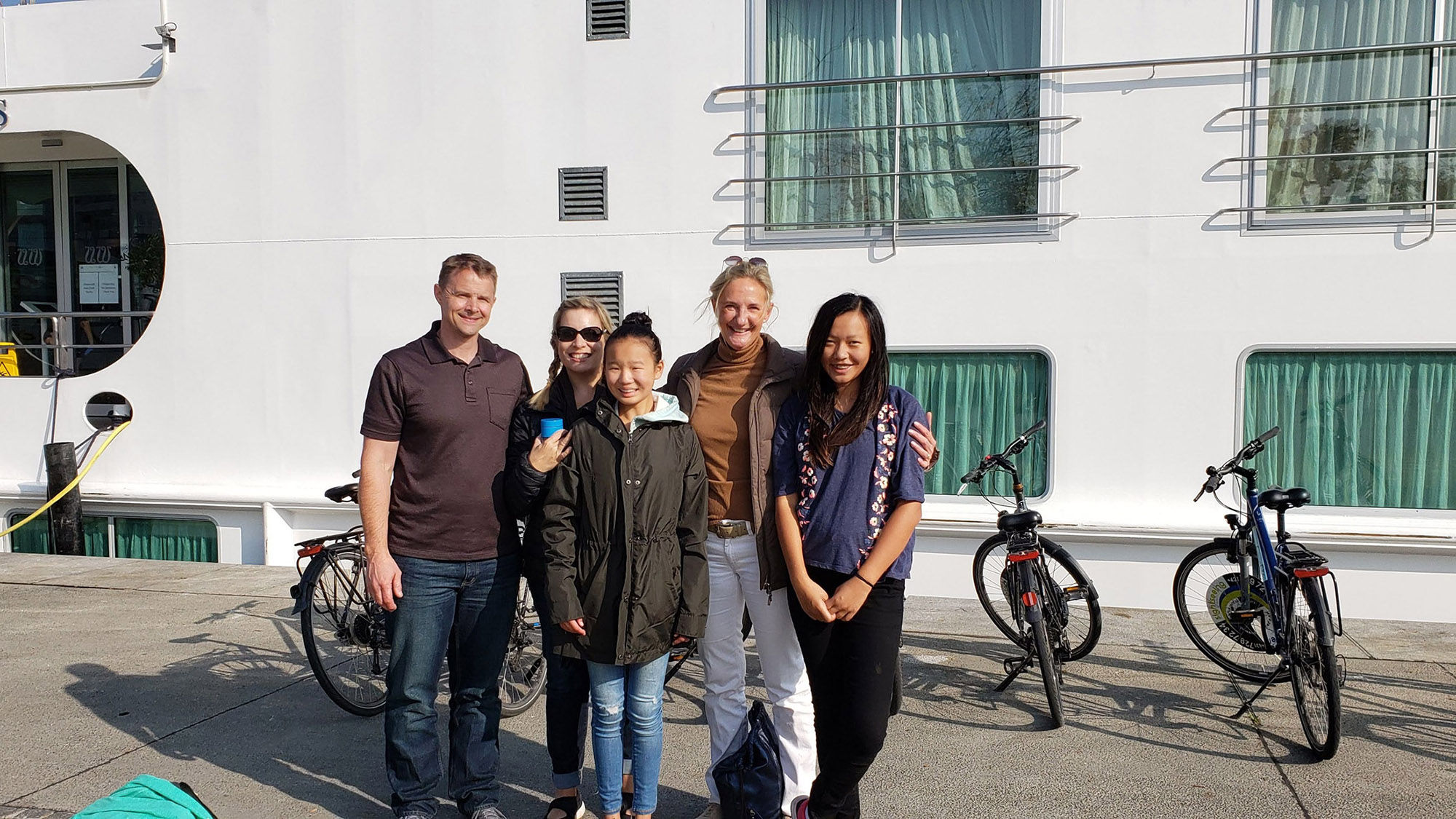 Suzy Schreiner of Azure Blue Vacations, second from left, with her husband and children and their bicycle tour guide in Vienna, while on Avalon's Active and Discovery cruise.
