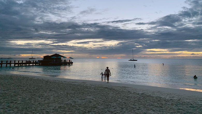 Sunset in Noord, Aruba. The island is no longer offering visitors the option to test upon arrival.