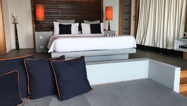 Bedroom with sitting area, measuring 517 square feet, that are part of a 2,800-square-foot one-bedroom villa at Sri Panwa on Phuket Island. Bedroom with sitting area, measuring 517 square feet, that are part of a 2,800-square-foot one-bedroom villa at Sri Panwa on Phuket Island.