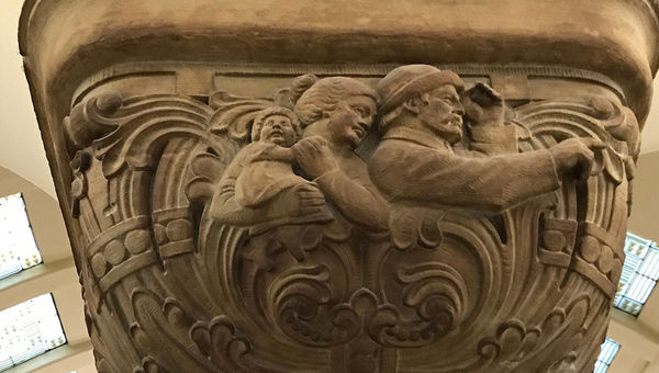 Bas-relief on a capital in the Metz-Ville railroad station illustrating a couple returning from their honeymoon -- with their new baby. Bas-relief on a capital in the Metz-Ville railroad station illustrating a couple returning from their honeymoon -- with their new baby.