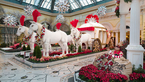 Four 12-foot-tall white horses stand in the East Garden of Bellagio Conservatory & Botanical Garden. Four 12-foot-tall white horses stand in the East Garden of Bellagio Conservatory & Botanical Garden.