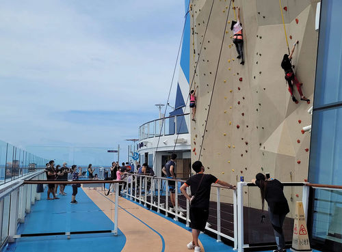 Cruisers climb the ship's Rock Wall. Cruisers climb the ship's Rock Wall.