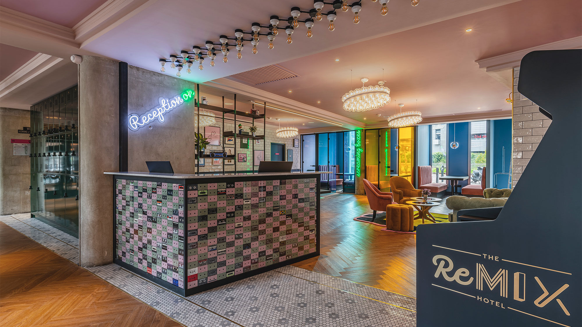 The reception desk at the ReMIX Hotel is decorated with cassette tapes.