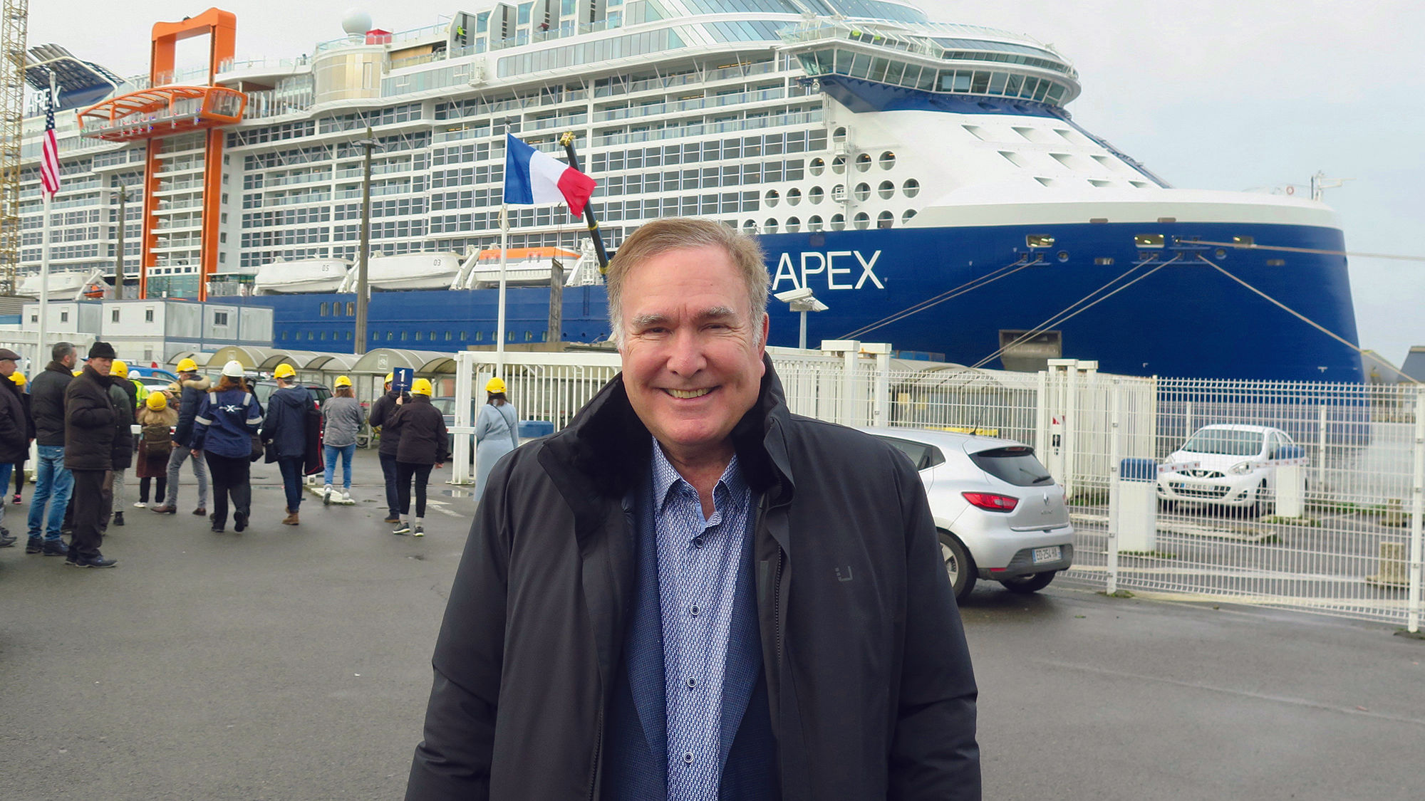 Royal Caribbean Group CEO Richard Fain with the Celebrity Apex in January. The company is embarking on a program to provide loans to travel agencies.