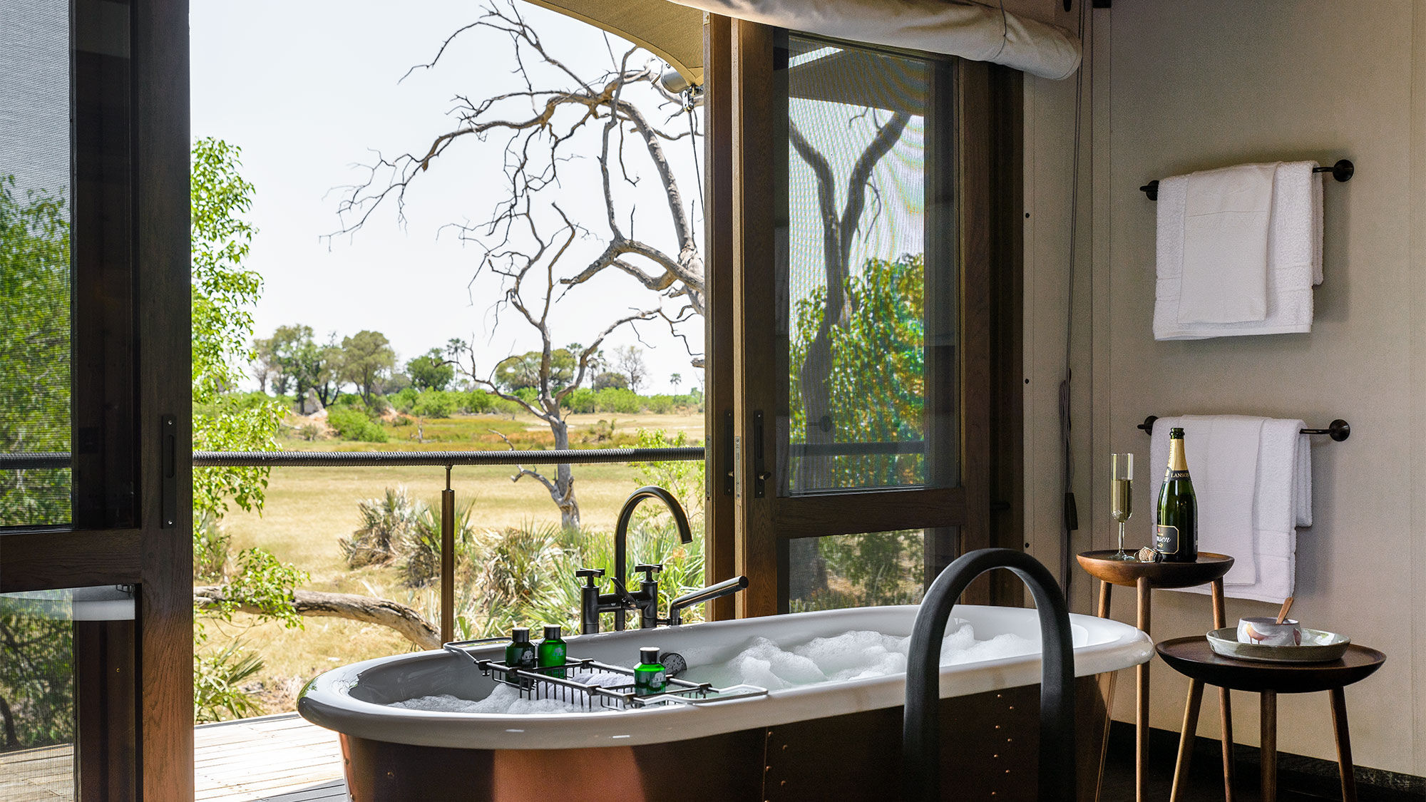 The view of the Okavango Delta from a bathtub in one of the 12 suites at the Xigera Safari Lodge.