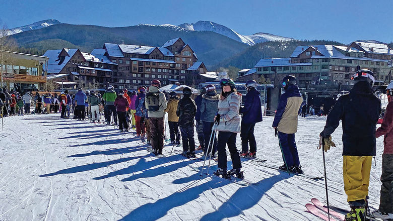Long lift and gondola lines like this one forced Colorado's Winter Park to require pass holders to make reservations this winter, reversing its initial no-reservation policy.