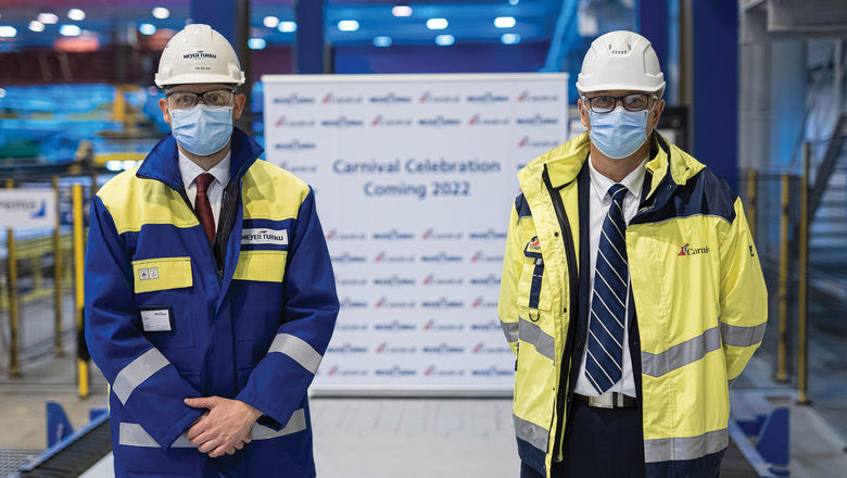 A ceremony to mark the steel cutting was attended by Meyer Turku CEO Tim Meyer, left, and Carnival's senior vice president of newbuilds, Ben Clement.