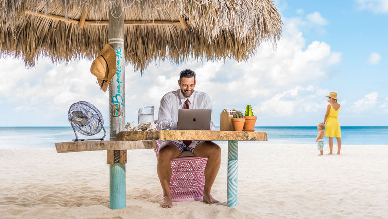 The Boardwalk Boutique Hotel Aruba has developed workstations that are just a stone's throw from the sea, so guests can take a dip whenever writer's block sets in.