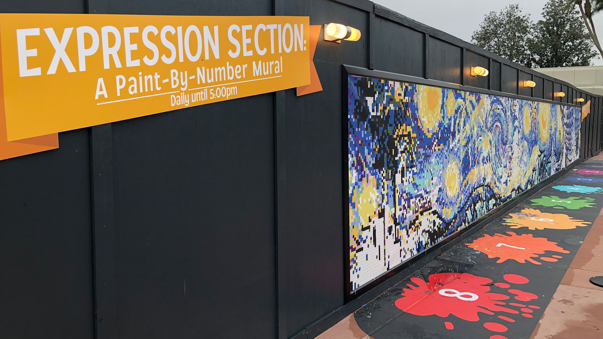 This paint-by-numbers mural on a construction wall at Epcot in Disney World is part of the ongoing Taste of Epcot International Festival of the Arts