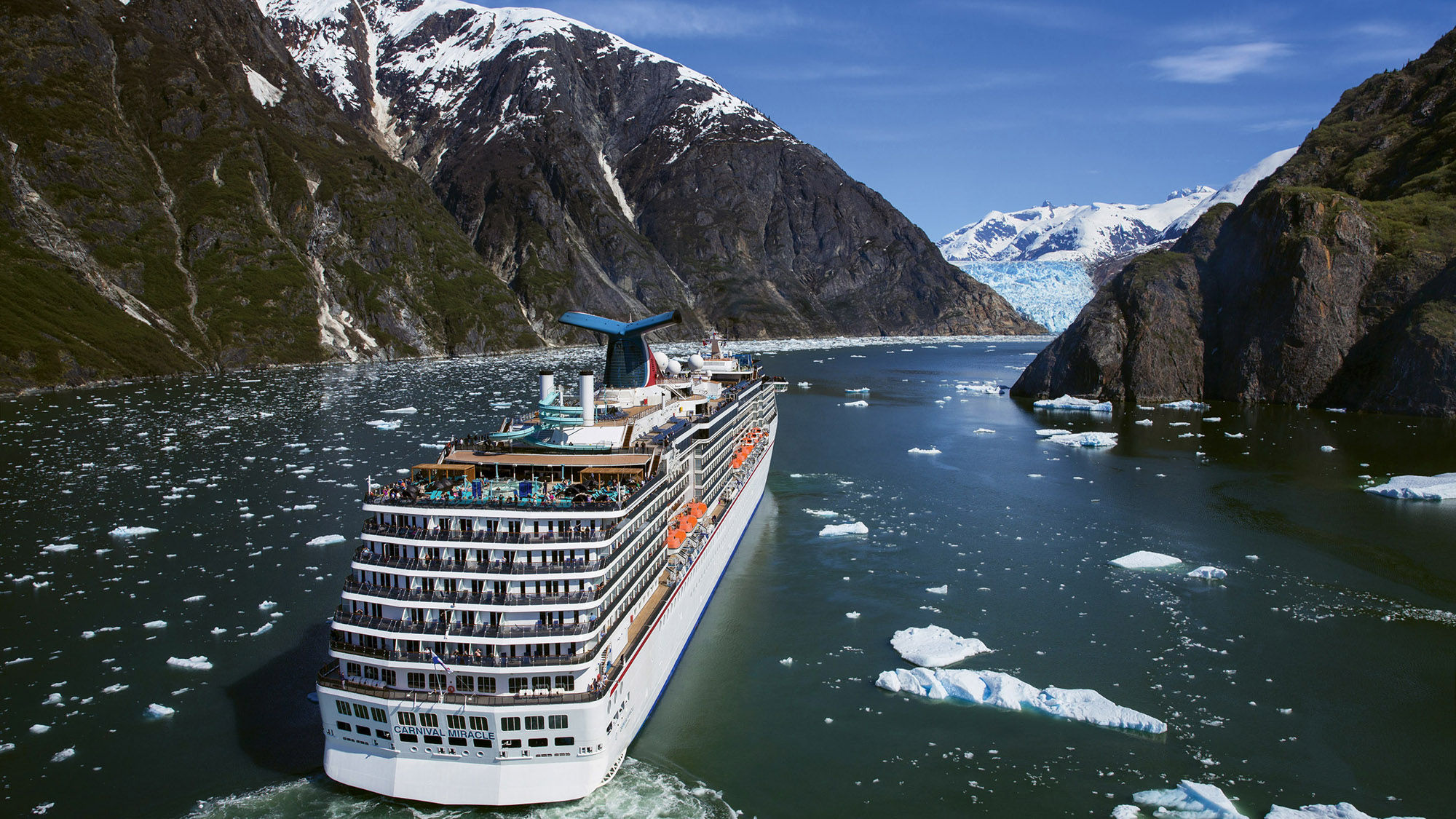 The Carnival Miracle cruising in Alaska.