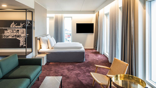 A guestroom at the Comwell Copenhagen Portside Dolce by Wyndham. A guestroom at the Comwell Copenhagen Portside Dolce by Wyndham.