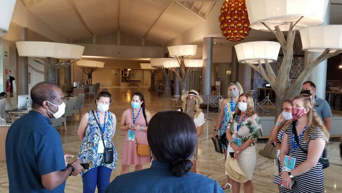 Travel advisors get updates on Covid-19 health protocols from Clifton Reader, managing director of Moon Palace Jamaica.