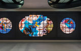 Artist Kehinde Wiley's stained-glass ceiling installation, titled "Go." The piece draws inspiration from 18th-century European ceiling frescos.