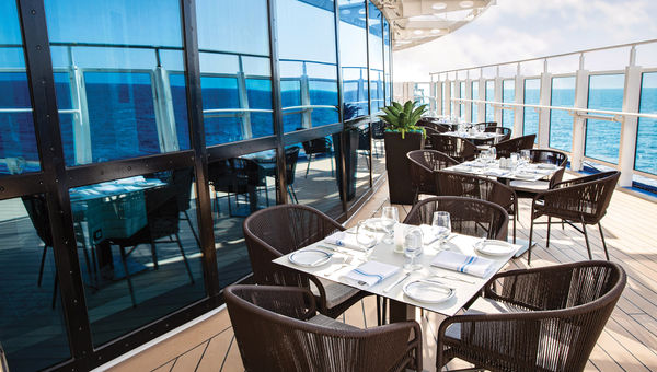The outdoor seating area at Bistro Sur La Mer on the Sky Princess.