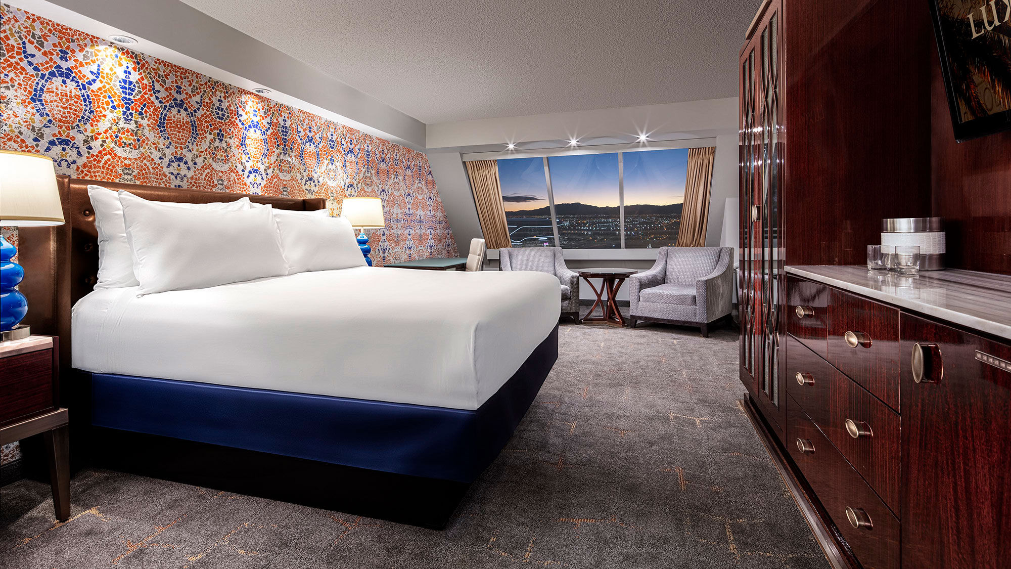 Bold splashes of orange and blue colors, with gold accents, highlight the new look of the Pyramid Tower rooms.