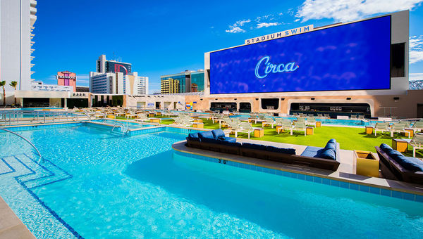 Stadium Swim at Circa features a towering, 14 million-megapixel video screen overlooking its six pools. Stadium Swim at Circa features a towering, 14 million-megapixel video screen overlooking its six pools.