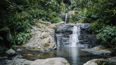 Delicias Falls in central Puerto Rico, about a half-hour’s drive from San Juan. The island is eliminating the Covid-testing requirement for vaccinated travelers from the U.S.