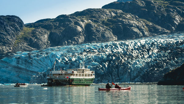 UnCruise Adventures guests kayaking in Glacier Bay with Wilderness Adventurer. UnCruise Adventures guests kayaking in Glacier Bay with Wilderness Adventurer.