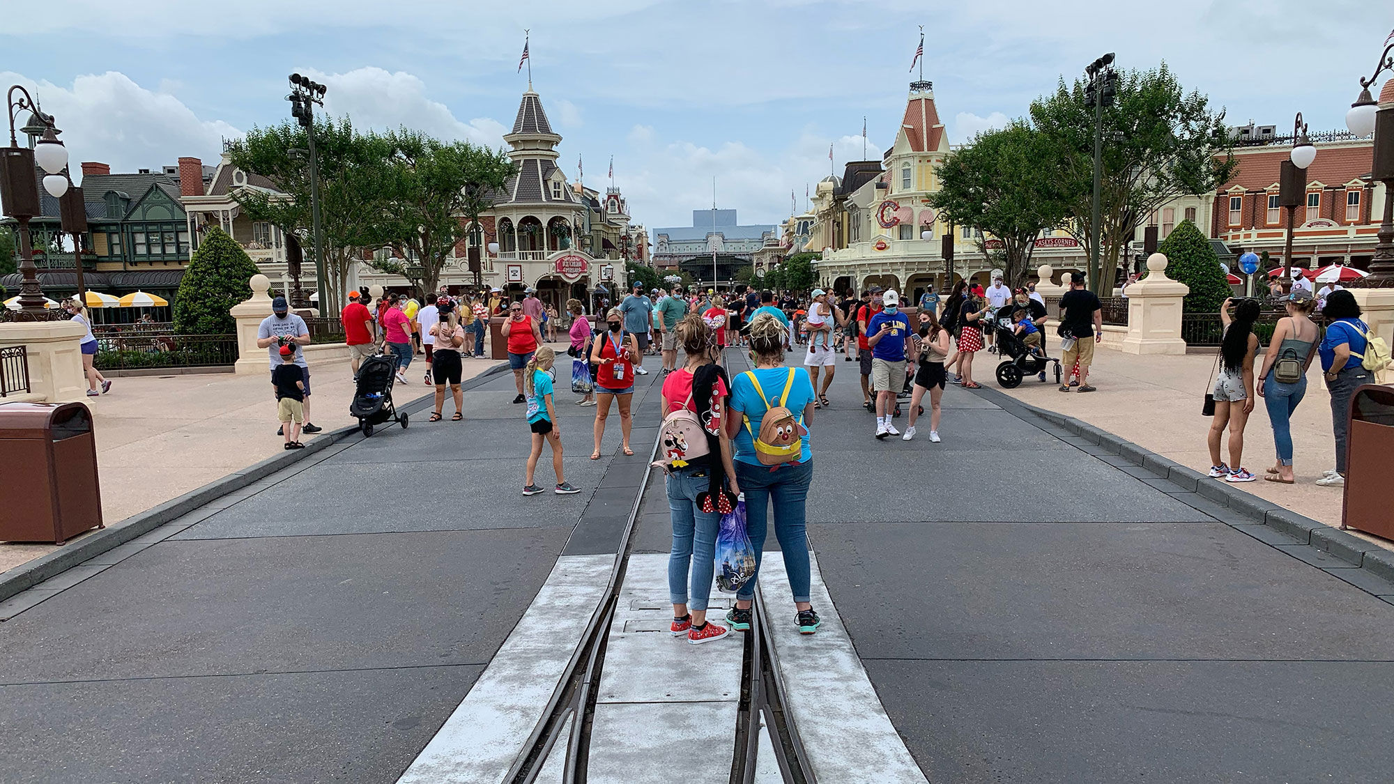 Magic Kingdom park visitors on Main Street. Crowds appeared to pick up midmorning and then taper off in the afternoon, our reporter found.